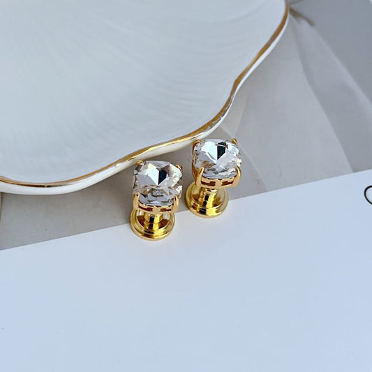 Gold-tone square stud earrings with clear rhinestone squares