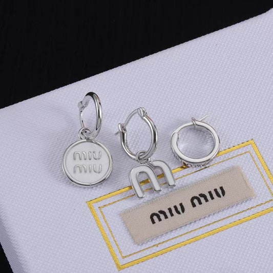 Miu Miu three-piece asymmetrical enamel earring set