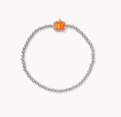 Silver beaded necklace bracelet with orange pumpkin charm and clear accents
