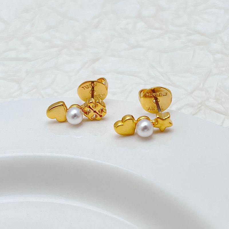Tory Burch gold-tone asymmetrical earrings: heart, star, and pearl with stud backs