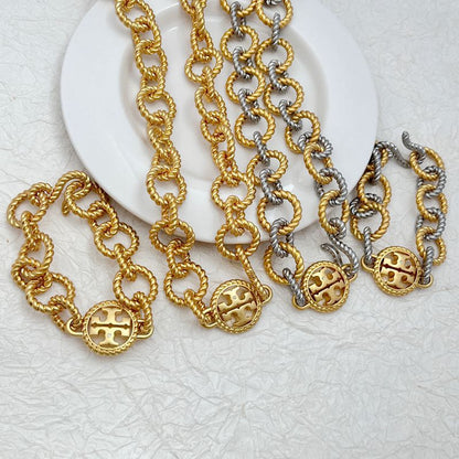 Tory Burch round openwork logo heavy metal bracelet necklace set
