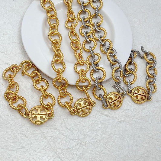 Tory Burch round openwork logo heavy metal bracelet necklace set