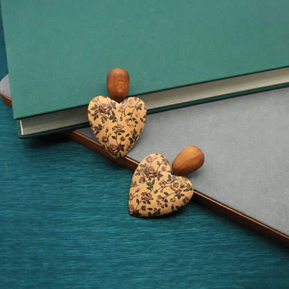 Handcrafted wooden heart-shaped earrings with beige floral print and wood drops