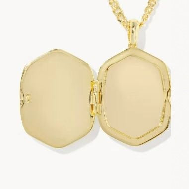 Gold-plated octagon pendant back with two hinged halves and chain bail