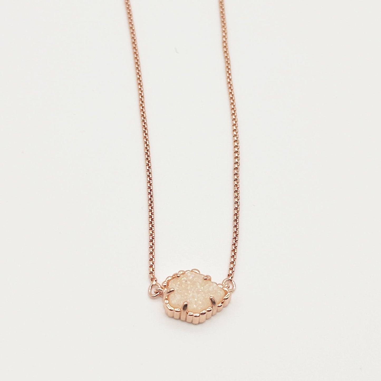 Kendra Scott rose gold-tone mother-of-pearl necklace with white iridescent rhombus pendant