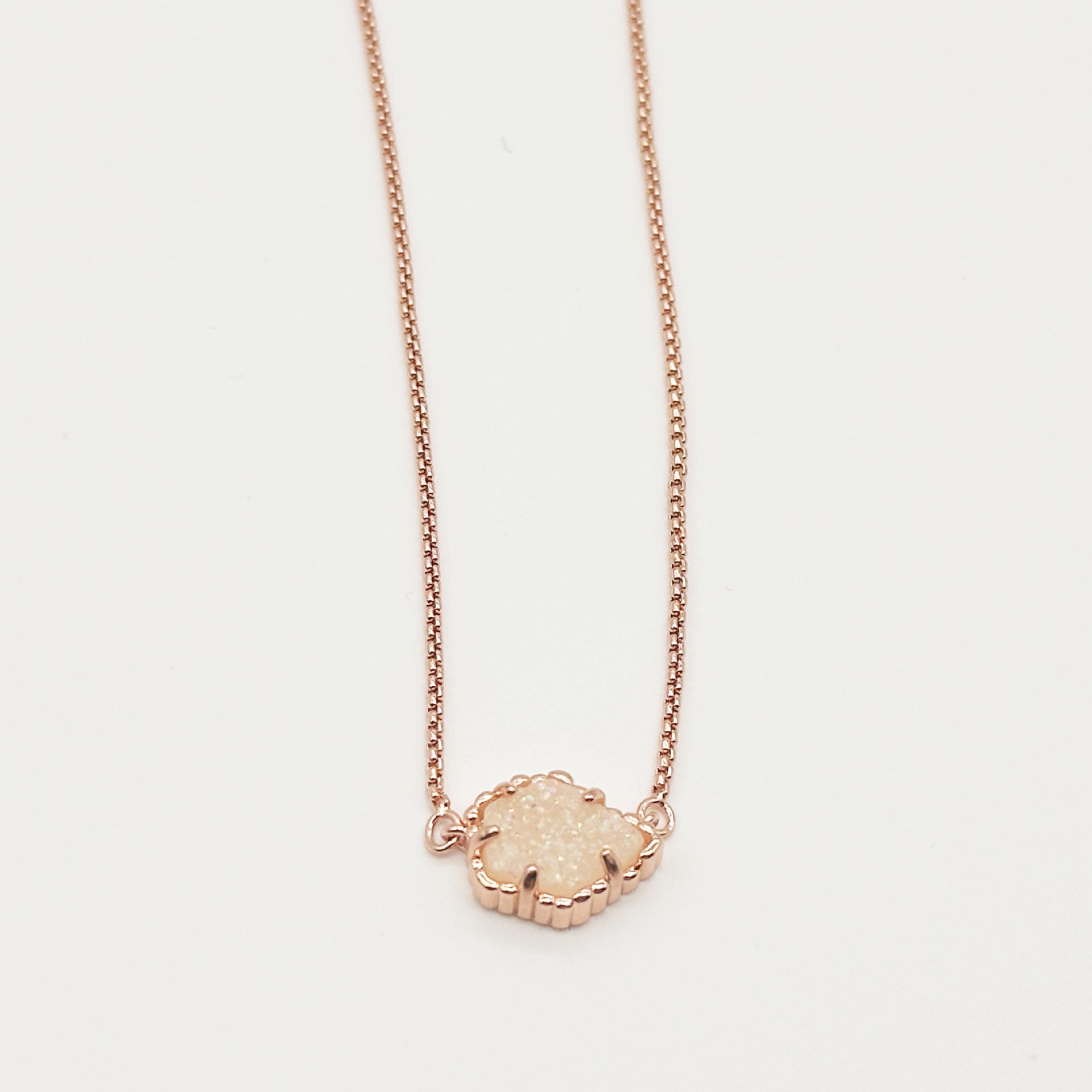 Kendra Scott rose gold-tone mother-of-pearl necklace with white iridescent rhombus pendant