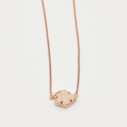 Kendra Scott rose gold-tone mother-of-pearl necklace with white iridescent rhombus pendant