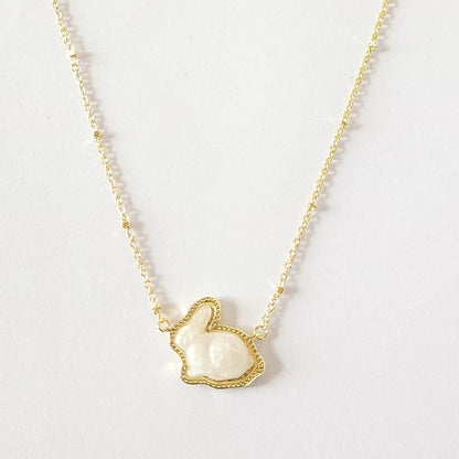 Gold-plated rabbit pendant necklace with white enamel on a gold chain