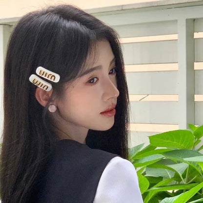 Miu Miu hair clips hair accessories