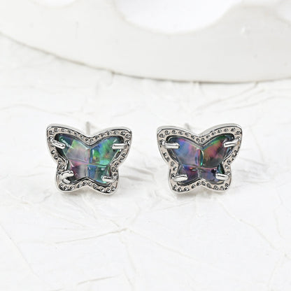 Silver butterfly stud earrings with iridescent multi-color stones