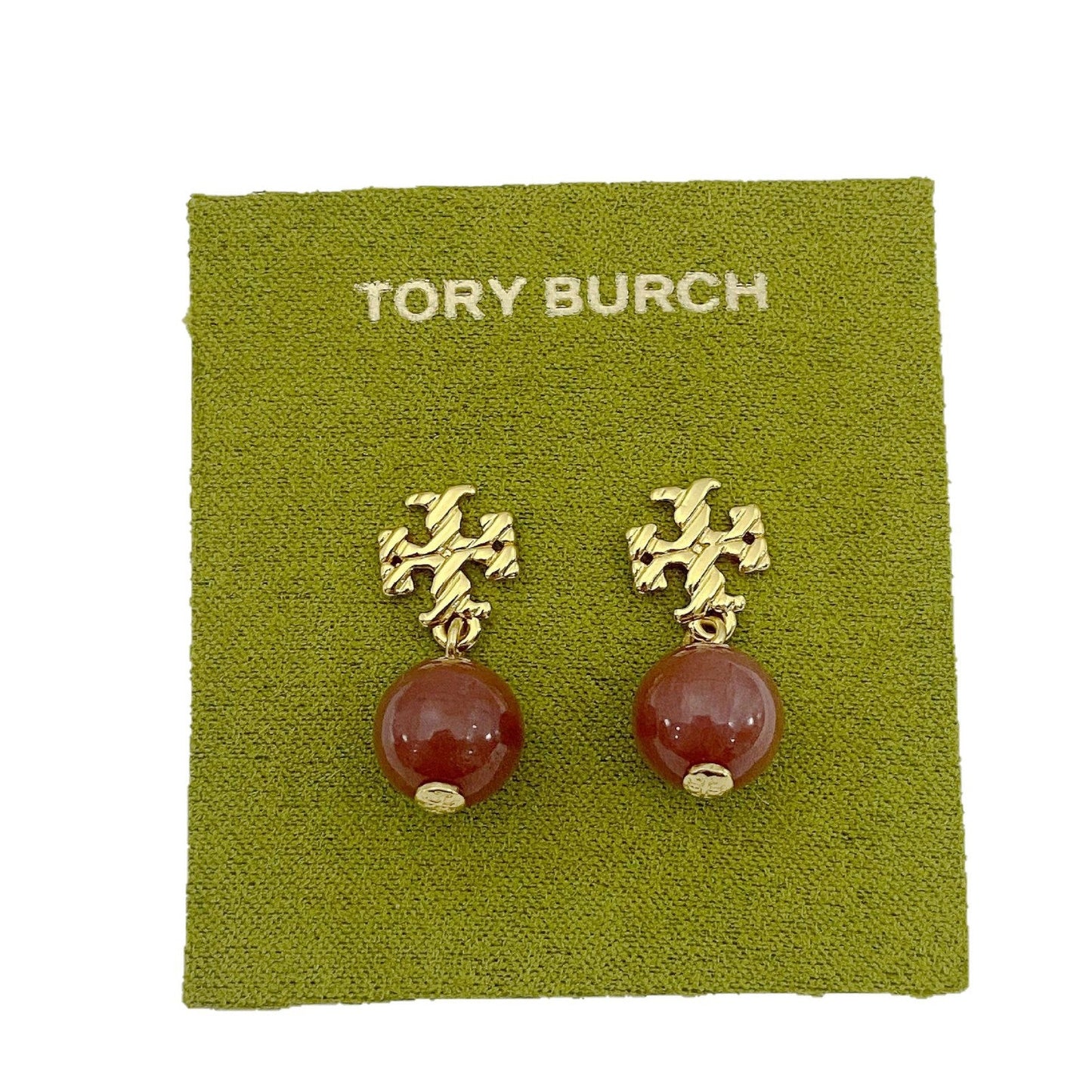 Gold-tone agate pendant earrings with round red stones and leaf-like top motif