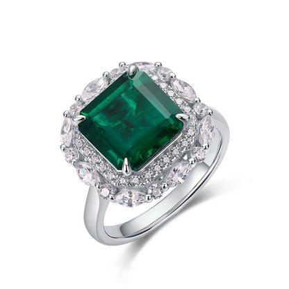 Sterling silver green emerald statement ring with halo of stones