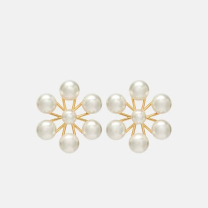 Pearl floral drop earrings with gold-tone starburst frames and multiple round pearls