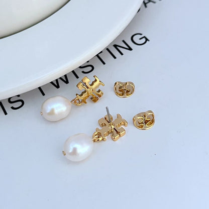 Gold-tone pearl drop stud earrings with ornate square settings and white pearls