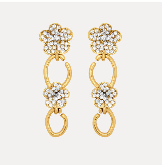 Floral dangle hoop earrings in gold tone with clear crystal flower clusters and loops