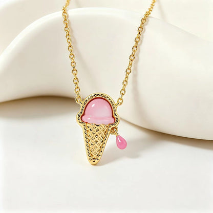 Pink ice cream charm necklace with gold chain and small dangling cone detail