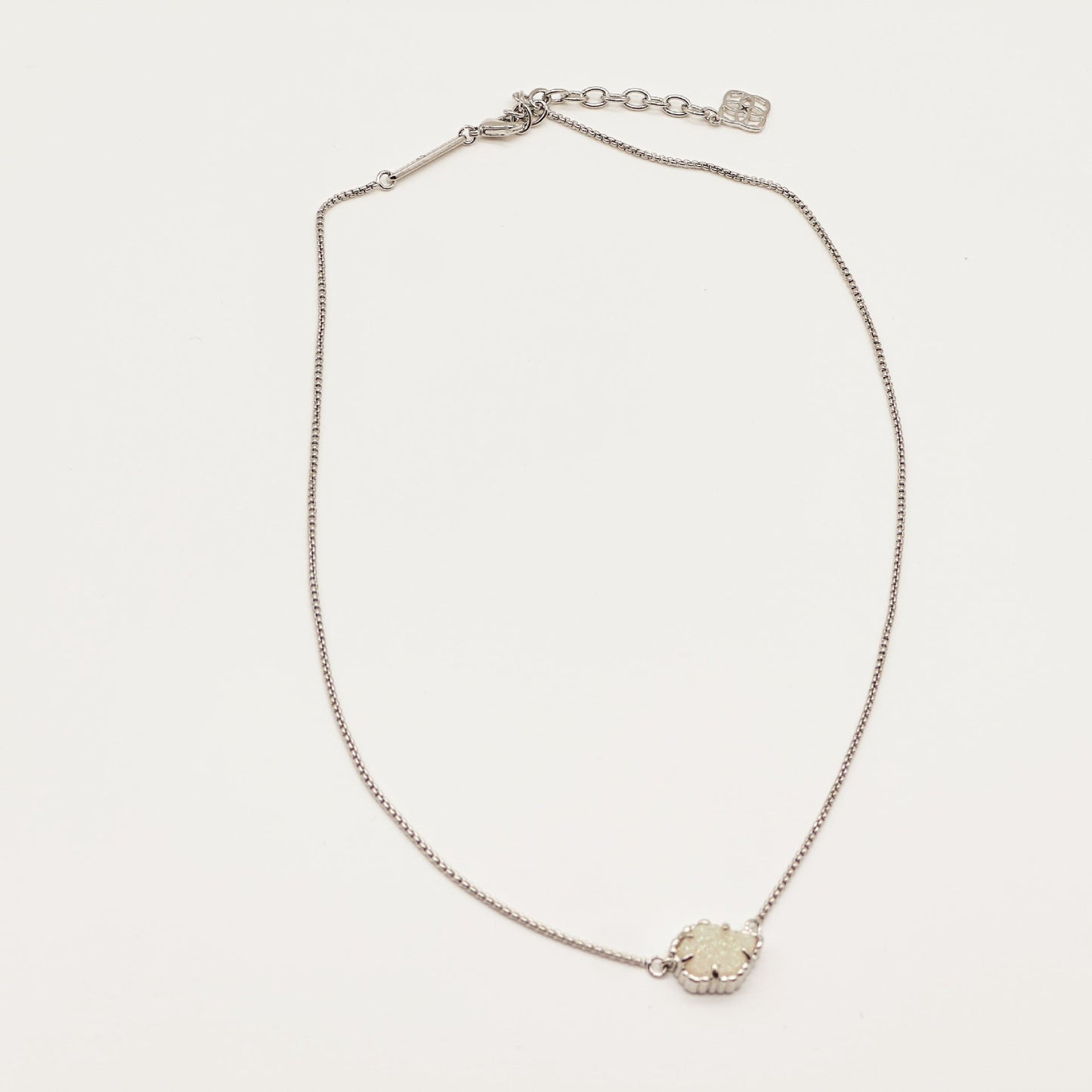 Kendra Scott silver-tone mother-of-pearl necklace with scalloped irregular rhombus pendant