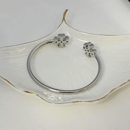 Open Tory Burch double logo metal bangle, silver tone, hinged clasp detail