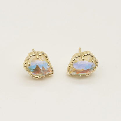 Pair of irregular rhombus stud earrings with iridescent opal-like stone and gold-tone bezel