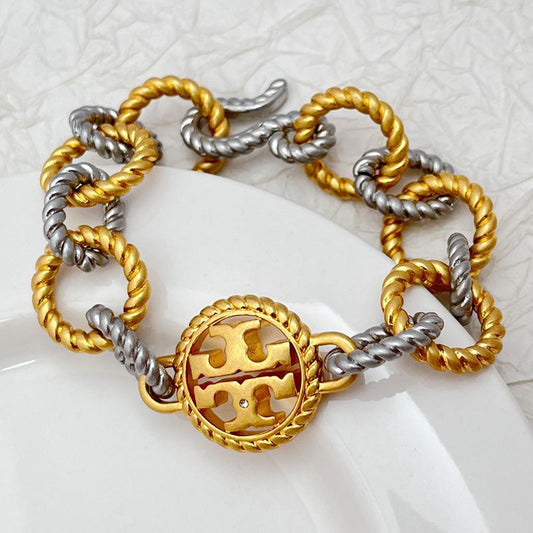Tory Burch round openwork logo heavy metal bracelet necklace set