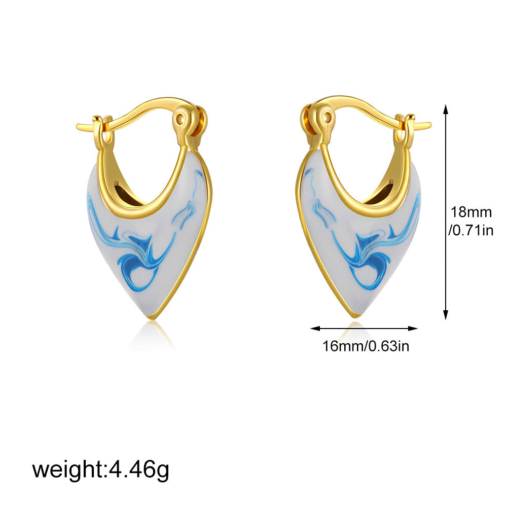 Gold-tone marbled teardrop hoop earrings with blue wave inlay, 18mm