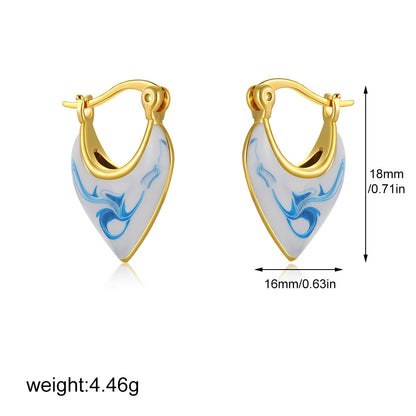 Gold-tone marbled teardrop hoop earrings with blue wave inlay, 18mm