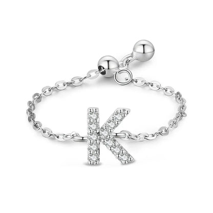 Sterling silver pavé letter K bracelet with link chain and round toggle clasp