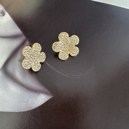 Gold-tone floral stud earrings with clear rhinestones