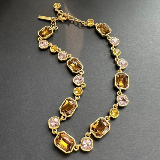 Square crystal pendant necklace with champagne and light pink faceted stones on gold chain