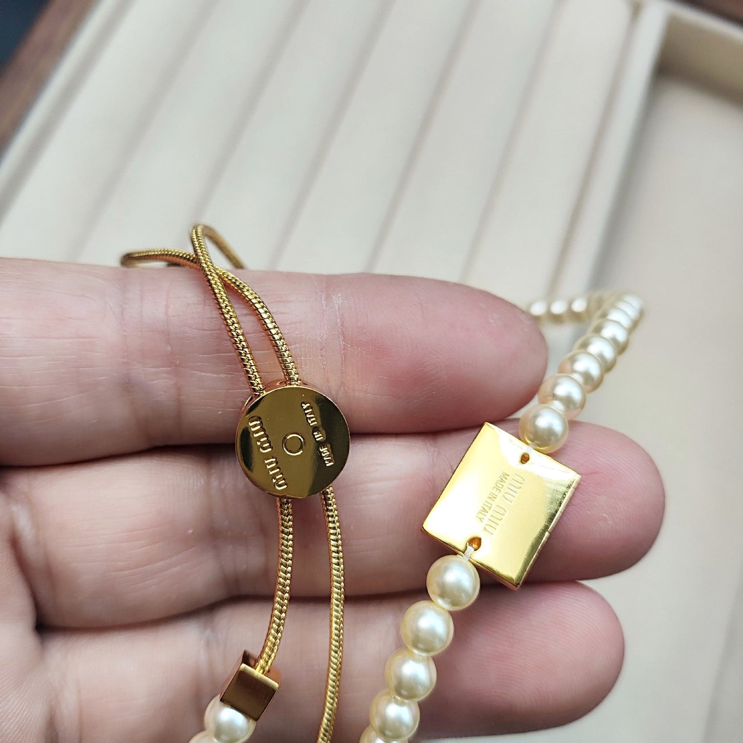 Miu Miu Adjustable Drawstring Elegant Tag Pearl Necklace