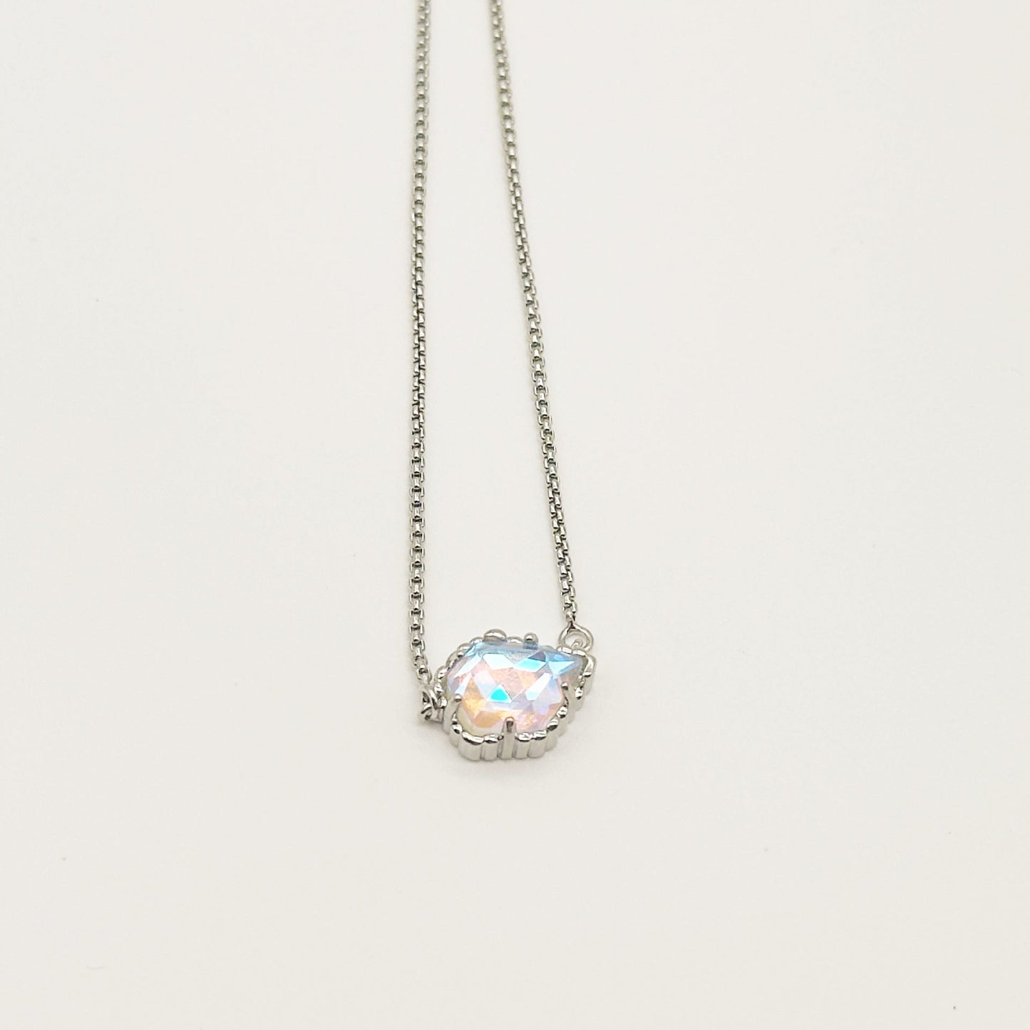 Kendra Scott silver-tone mother-of-pearl necklace with iridescent rhombus pendant