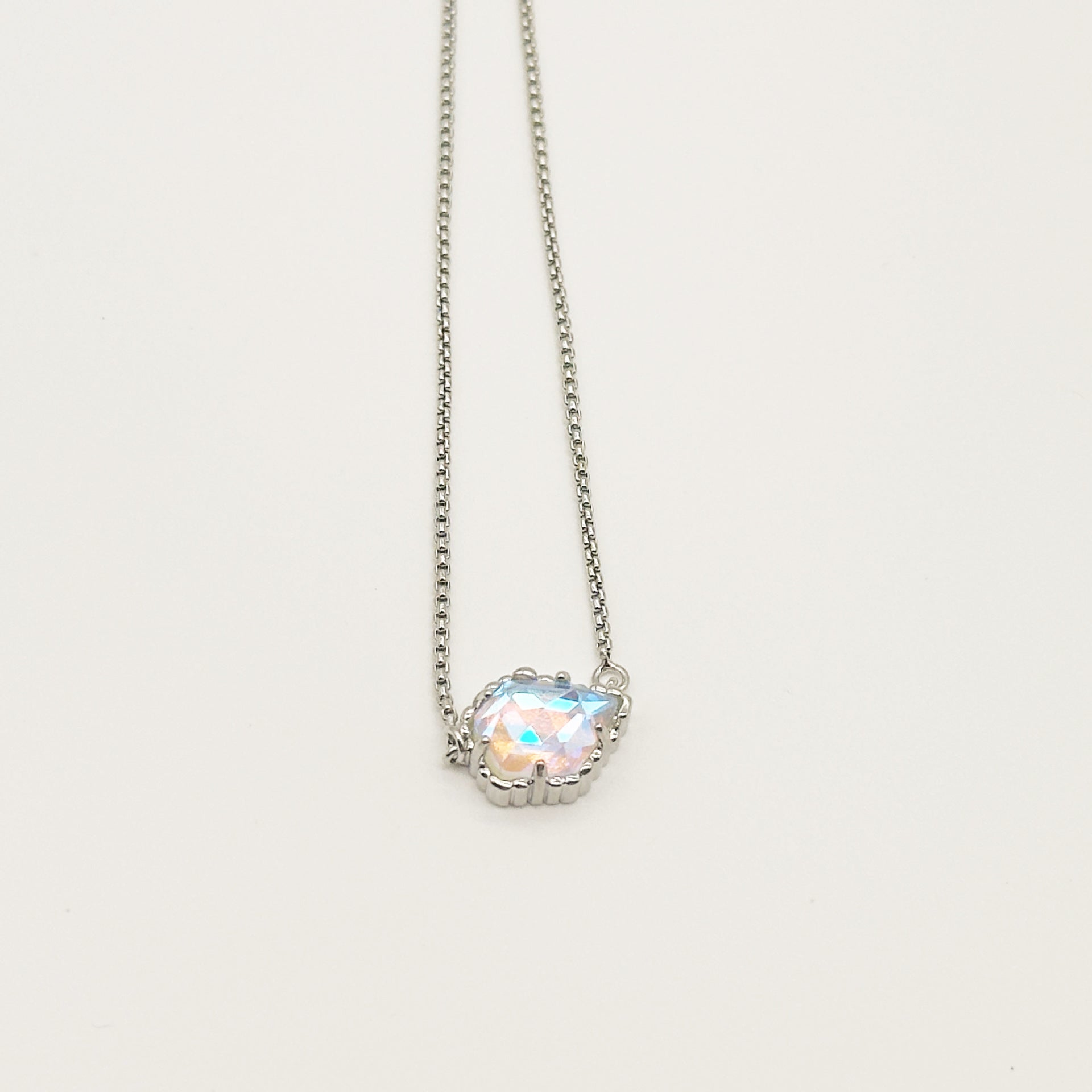 Kendra Scott silver-tone mother-of-pearl necklace with iridescent rhombus pendant