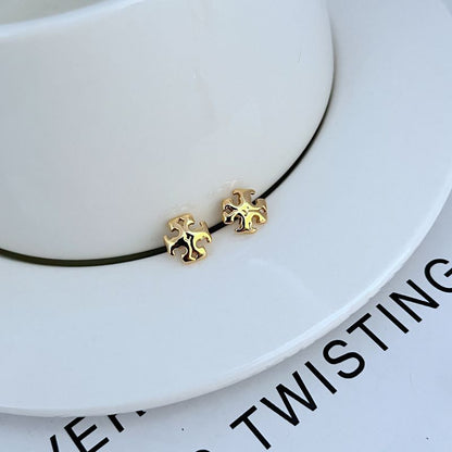 Sweet logo metal stud earrings, gold-tone interlocking emblem