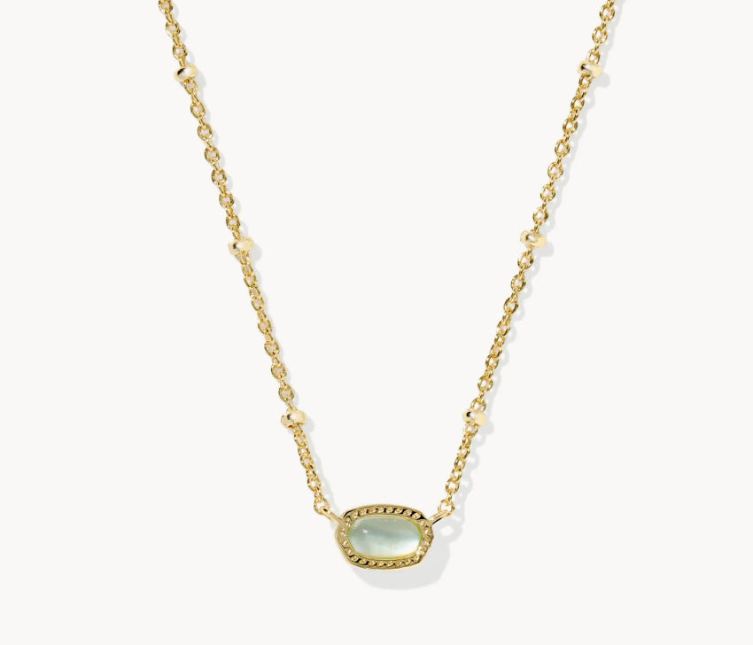 Gold-tone necklace with oval pale blue gemstone pendant on a fine chain.
