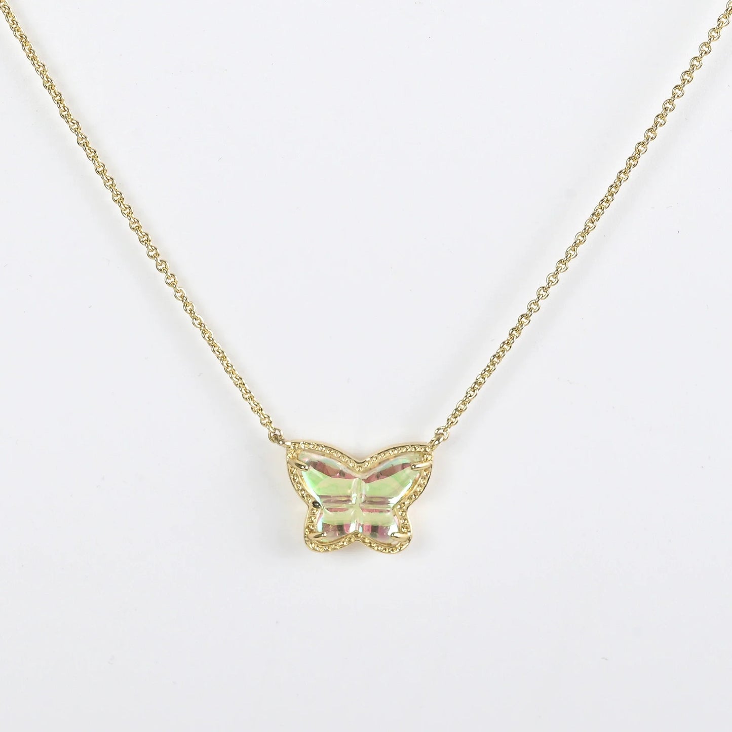 Gold butterfly pendant necklace with iridescent multi-color stone