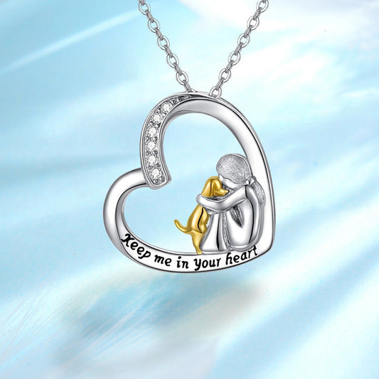Heart pendant necklace featuring a mother-and-child figure, “Keep me in your heart”