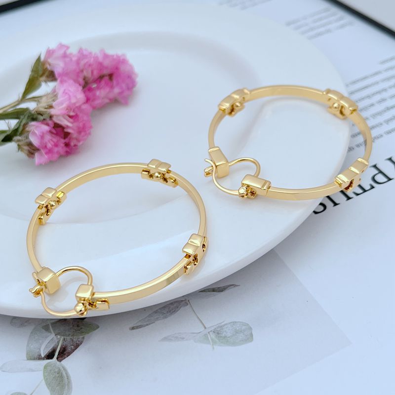 Tory Burch High-Shine 3D Logo Round Metal Large Earrings