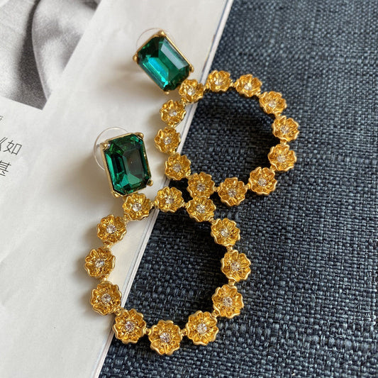 Oscar de la Renta Large Round Earrings with Floral Motif Zircon