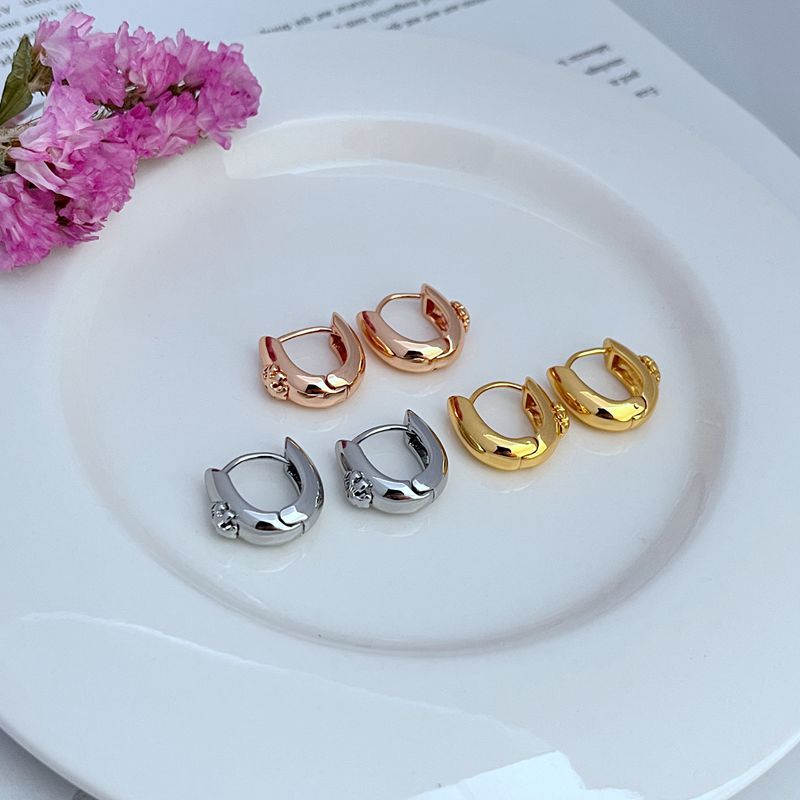 Tory Burch Chic Petite Smooth-Finish U-Shaped Metal Earrings