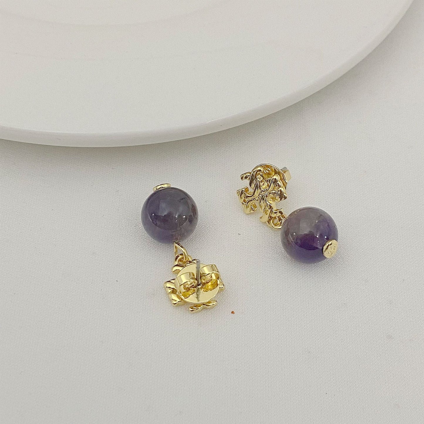 Agate pendant earrings with round purple beads and gold-toned textured settings