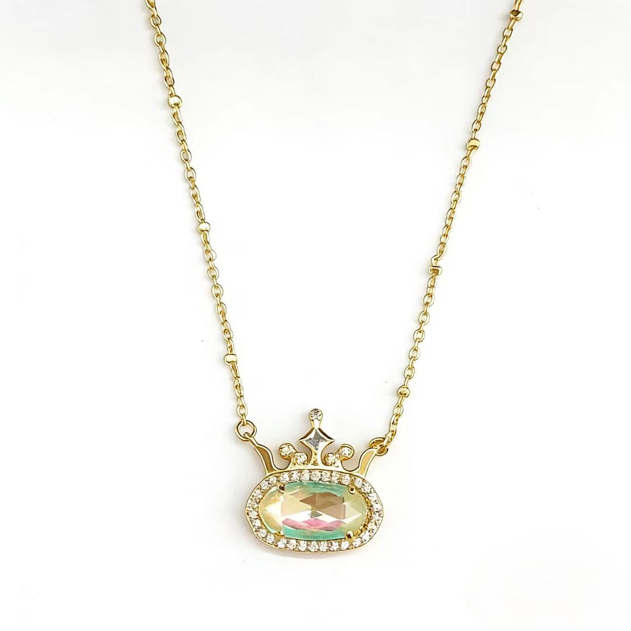 Gold-plated princess crown necklace with multicolor oval gemstone and diamond-style halo
