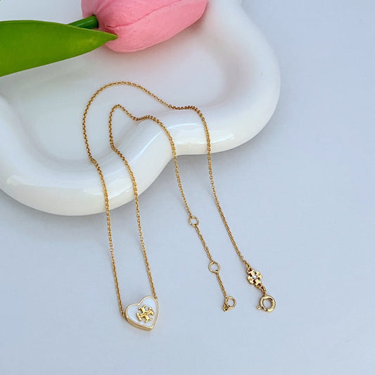 Heart pendant necklace set with gold-tone chain and enamel heart charms