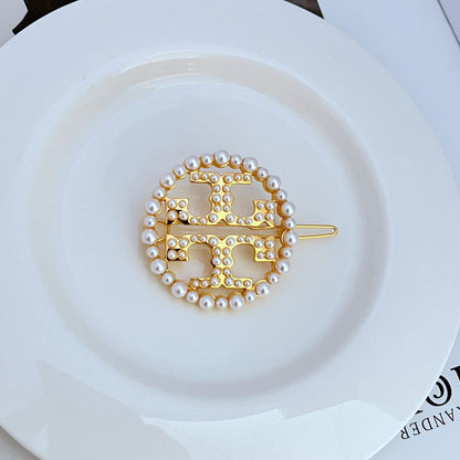 Tory Burch Pearl Openwork Circular Logo Exquisite Metal Hair Clip