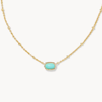 Gold-tone necklace with small oval turquoise gemstone pendant on a fine chain.