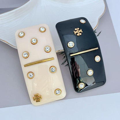 Tory Burch Haarklammer rechteckig mit Strass-Diamant-Logo, schwarz