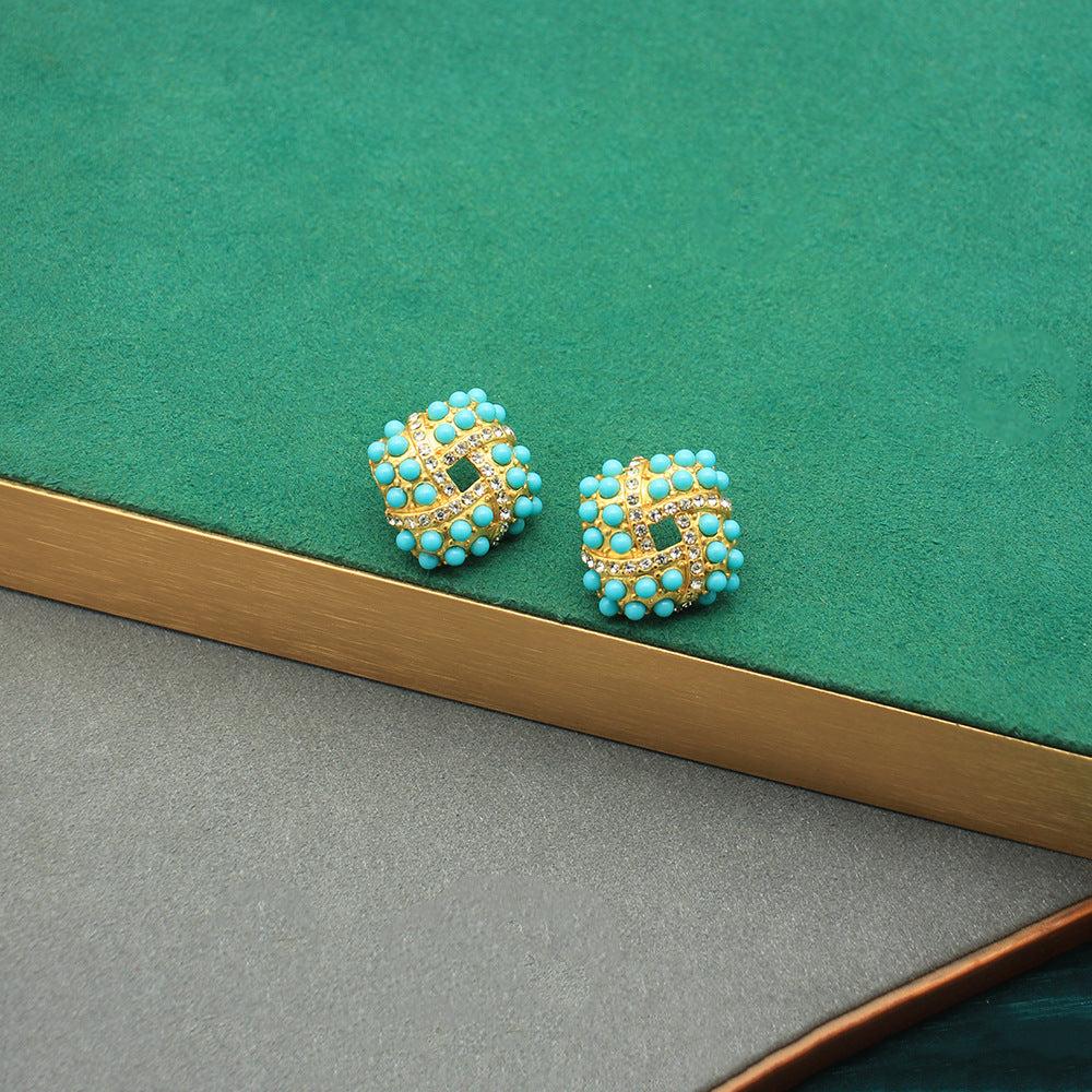 Blue turquoise beaded vintage-style stud earrings with gold-tone detailing