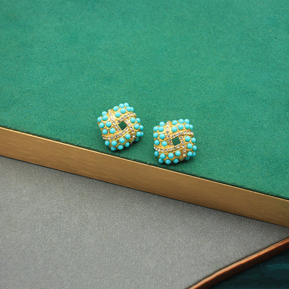Blue turquoise beaded vintage-style stud earrings with gold-tone detailing