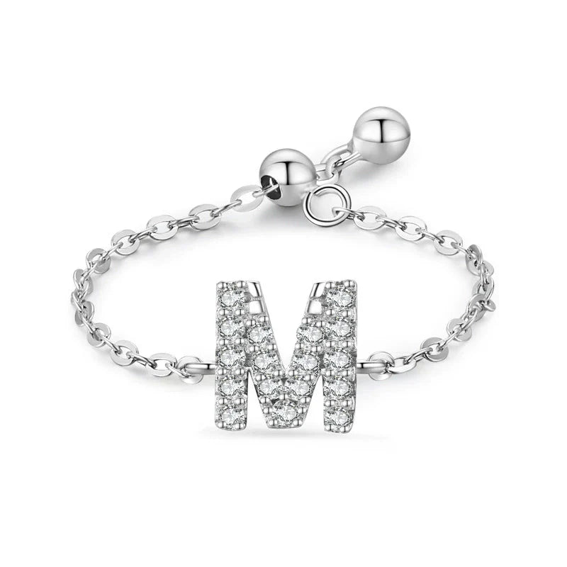 Sterling silver pavé letter M bracelet with link chain and round toggle clasp