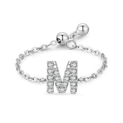 Sterling silver pavé letter M bracelet with link chain and round toggle clasp