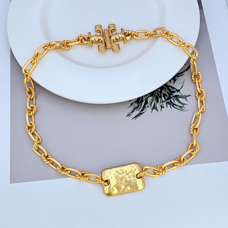 Tory Burch rectangular metal plaque thick chain necklace bracelet